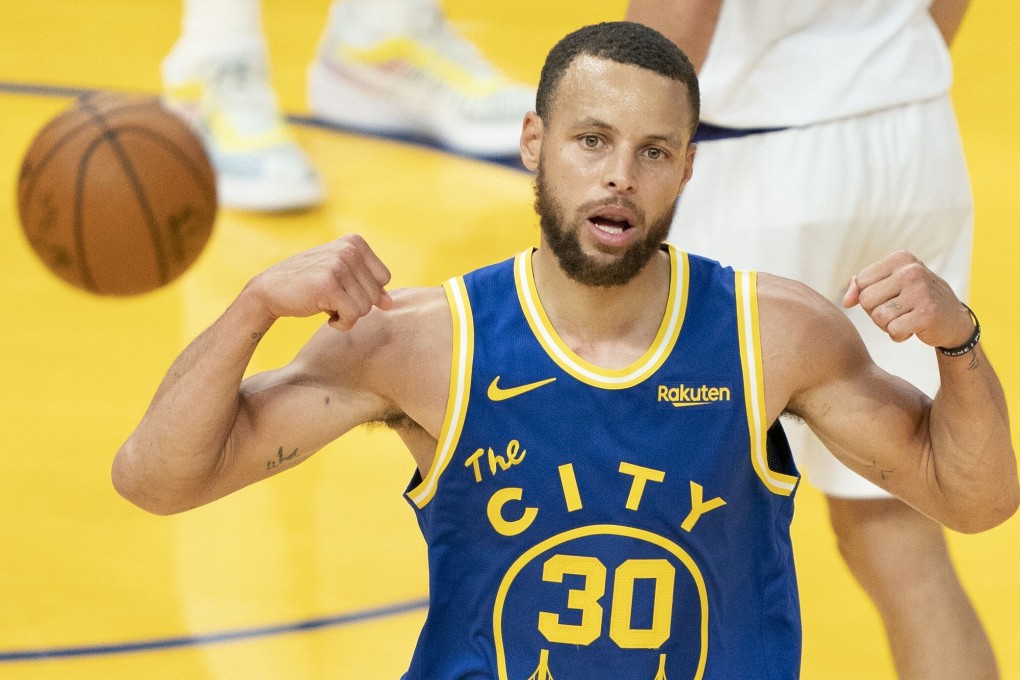 Golden State Warriors guard Stephen Curry celebrates after making a basket against the Phoenix Suns. Photo: Kyle Terada-USA Today Sports