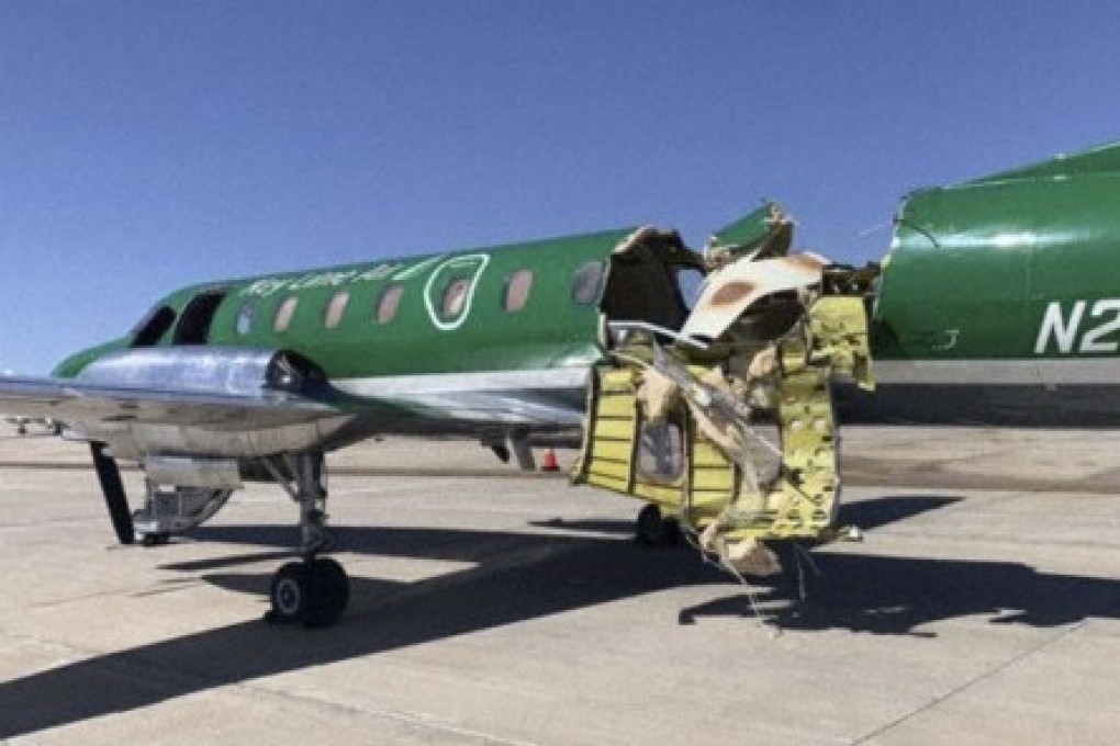 The Key Lime Air Metroliner sustained substantial damage to the tail section. Photo: CBS Denver via AP