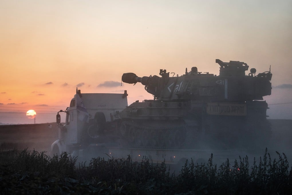 An Israeli army artillery battery is deployed at a position on the Israeli-Gaza border near Sderot on Thursday. Photo: dpa