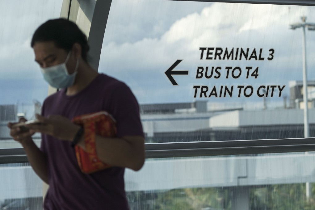 A man walks through Terminal 3 of Singapore’s Changi Airport. Photo: EPA