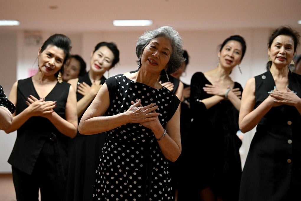 The Fashion Grandmas, elderly social media stars in China, rehearse for a TV performance in Beijing. Photo: Noel Celis/AFP