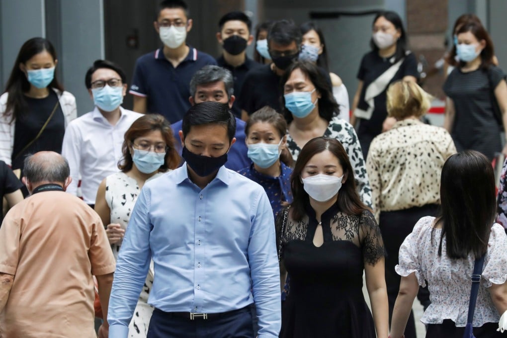 Singaporean office workers have been urged to work from home due to a surge in local Covid-19 cases. Photo: Reuters