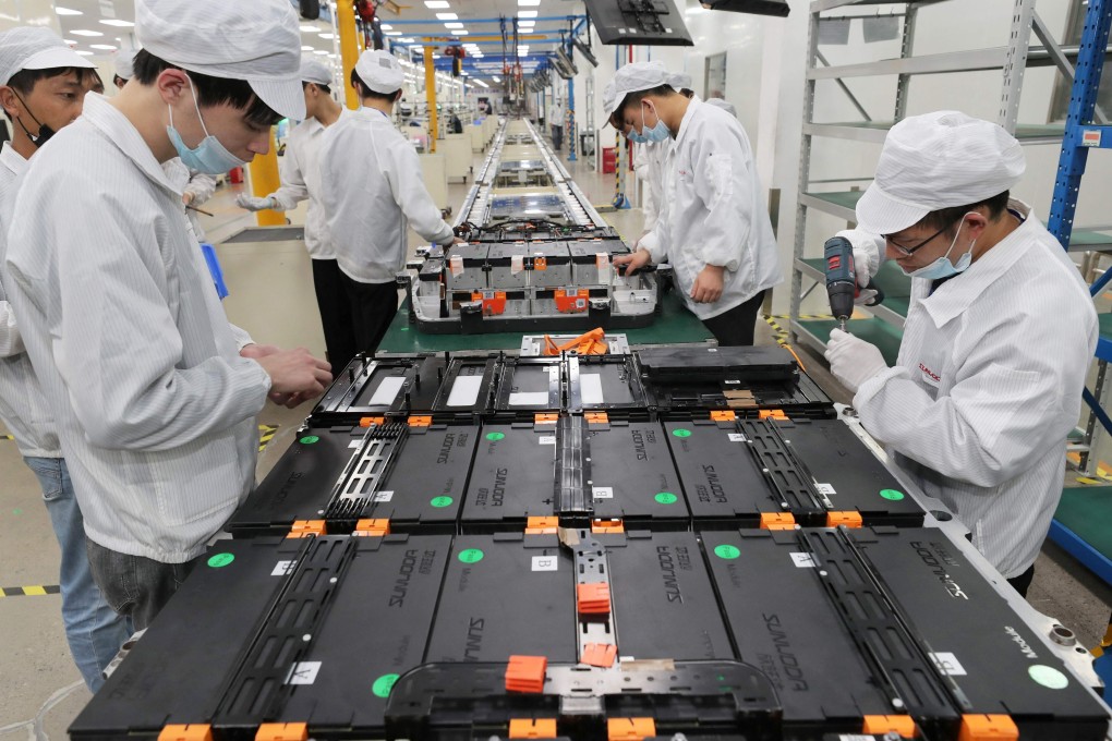 Workers at Xinwangda Electric Vehicle Battery make lithium batteries for electric cars and other uses, in Nanjing, in China’s eastern Jiangsu province. Photo: AFP