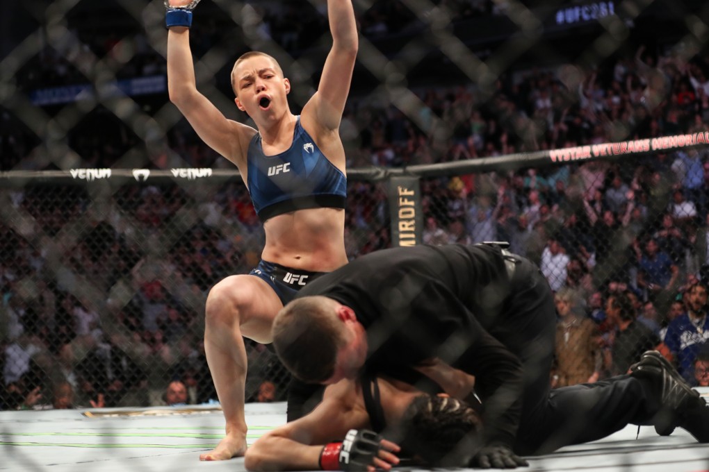 Rose Namajunas celebrates after beating Zhang Weili to win the strawweight title at UFC 261 in April. Photo: AFP