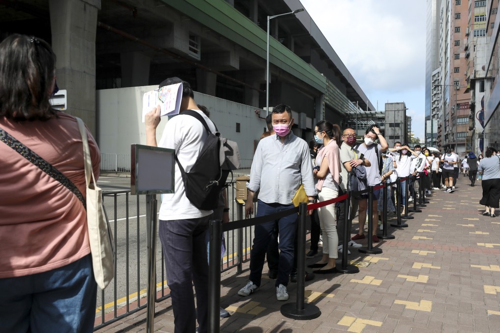 Property buyers queuing up to bid for Road King Infrastructure Limited’s South Land apartment project in Wong Chuk Hang on May 15, 2021. Photo: Xiaomei Chen