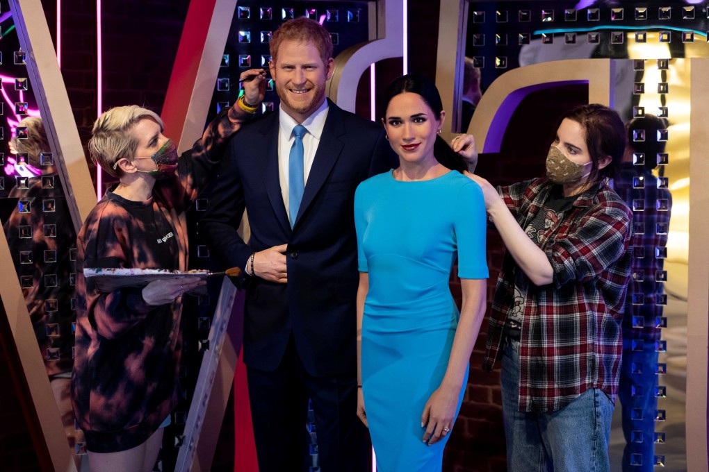 Artists prepare wax figures of Prince Harry and Meghan, Duchess of Sussex, in their new position in Madame Tussauds museum in London, UK on Wednesday. Photo: Madame Tussauds via Reuters