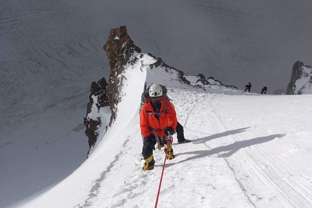 Vanessa O’Brien climbs to Camp 2 on K2, the second-highest mountain in the world. O’Brien has climbed the highest peak on every continent, skied to both poles, and reached the oceans’ lowest depths. Photo: Estalin Suarez Valladolid