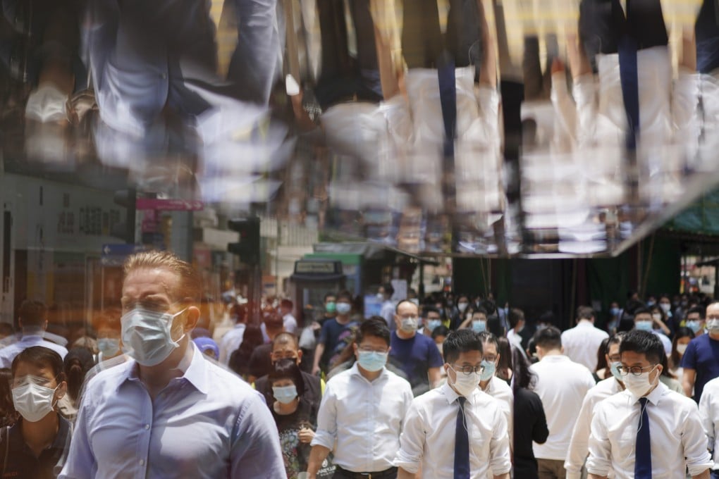 People on the street during lunch time in Central. Photo: Sam Tsang