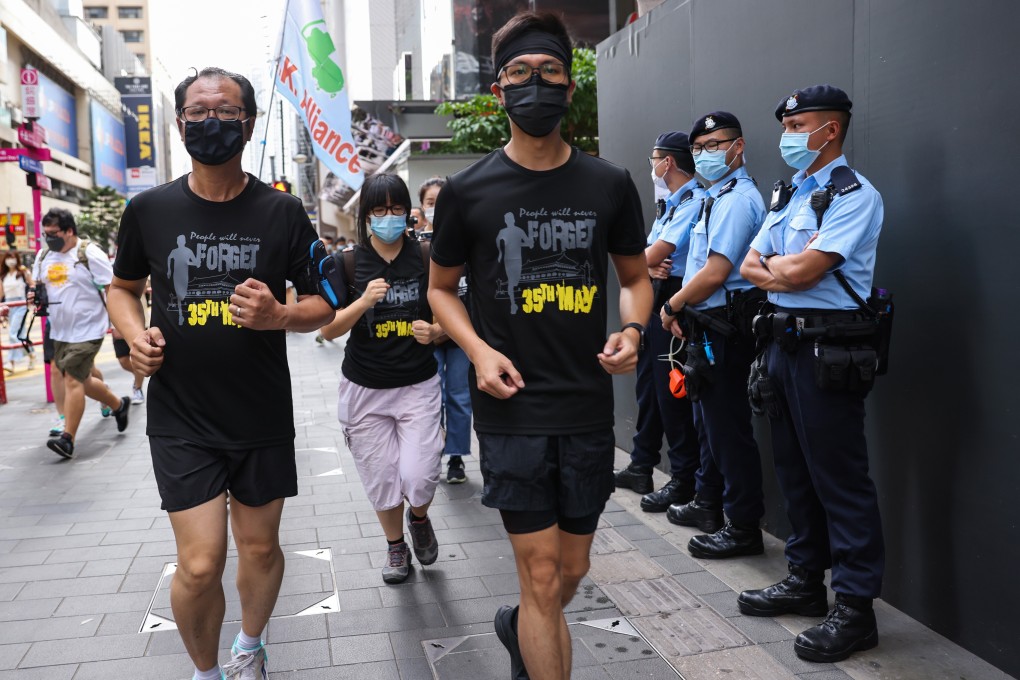 Members of Hong Kong Alliance in Support of Patriotic Democratic Movements of China take part in a marathon commemorating the Tiananmen Square crackdown on Sunday. Photo: Nora Tam