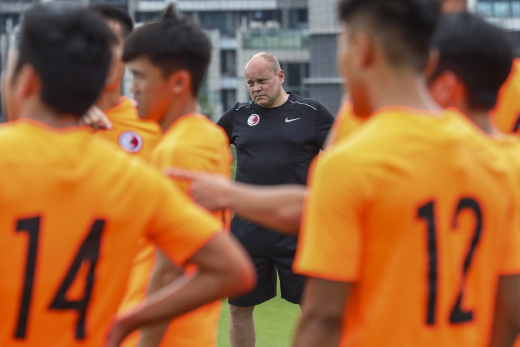 Hong Kong head coach Mixu Paatelainen (centre) takes his first training session at the HKFA’s Tseung Kwan O Football Training Centre. Photo: Felix Wong