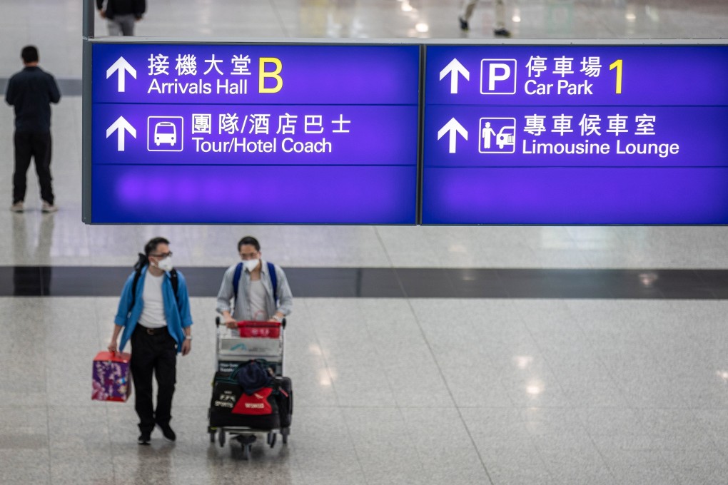 Passengers arrive at Hong Kong International Airport. Photo: EPA-EFE