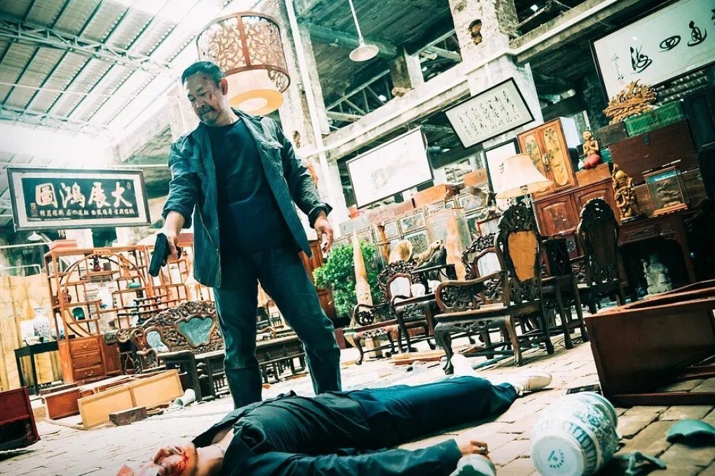 Jiang Wu (centre) in a still from Break Through the Darkness released by iQiyi.