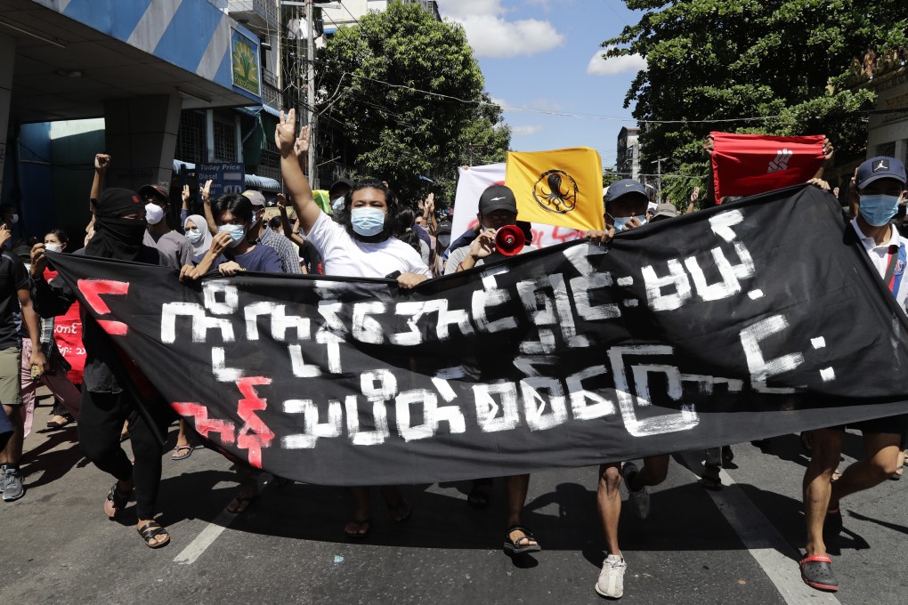 Protesters march in Yangon, Myanmar on Tuesday. Photo: EPA-EFE