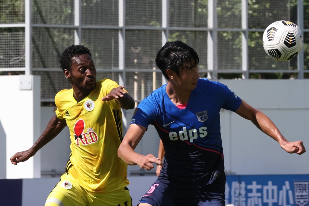 Pegasus’ Marquinhos and Kitchee’s Park Jun-heong battle for battle during their Hong Kong Premier League clash at Mong Kok Stadium. Photos: K.Y. Cheng