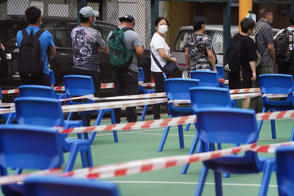 Hongkongers queue for Covid-19 screenings at a mobile testing centre in April. Photo: Winson Wong