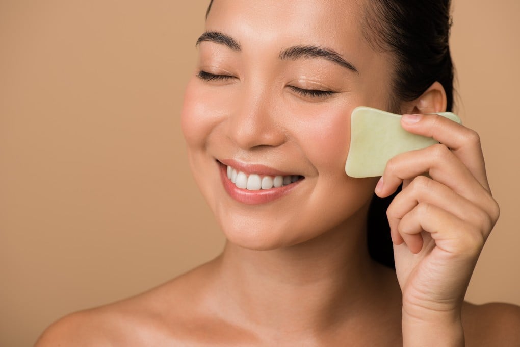 Initially practised on the body, gua sha has become a facial skincare technique that can also help with conditions such as jaw pain, headaches, seasonal allergies and sinus congestion, one expert says. Photo: Shutterstock