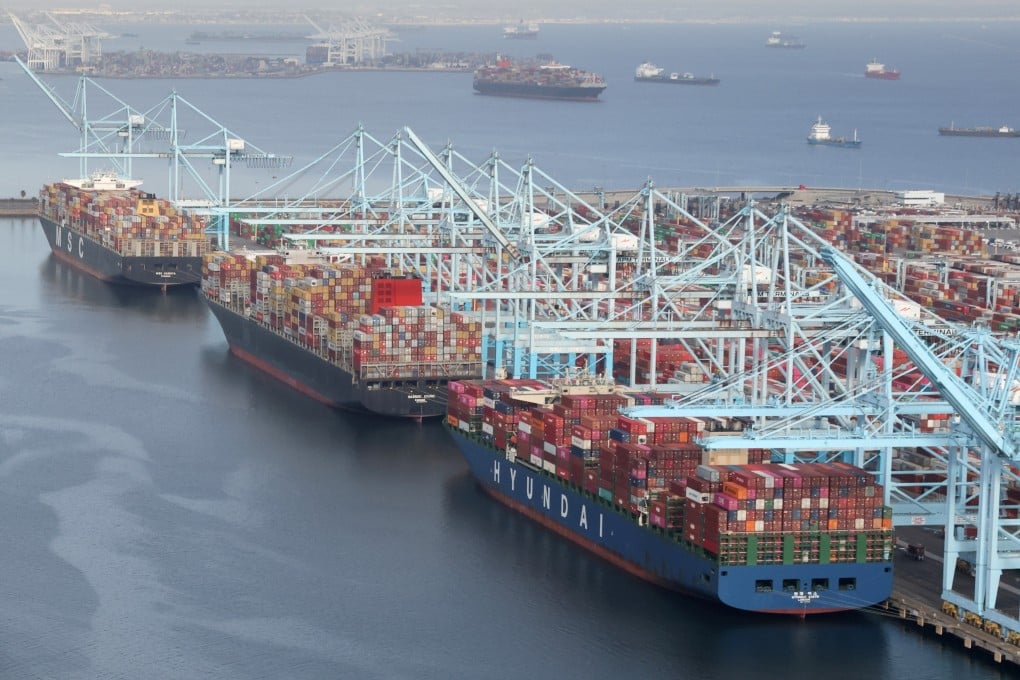 Shipping containers are unloaded from vessels at a terminal in the Port of Long Beach-Port of Los Angeles complex in Los Angeles on April 7. Photo: Reuters