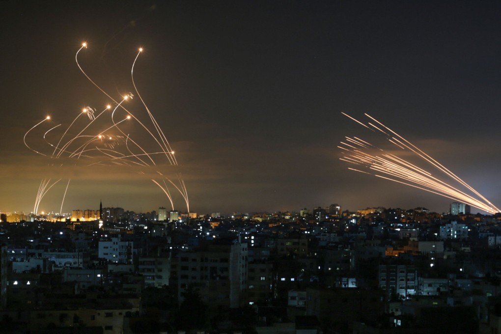 Rockets are seen in the night sky fired towards Israel from Beit Lahia in the northern Gaza Strip on May 14, 2021. Photo: AFP