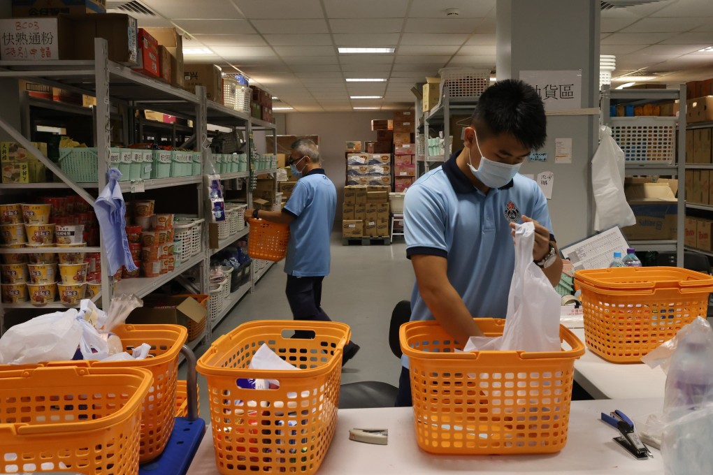 Staff preparing food deliveries at the Penny‘s Bay quarantine centre on Hong Kong’s Lantau Island. Photo: Dickson Lee