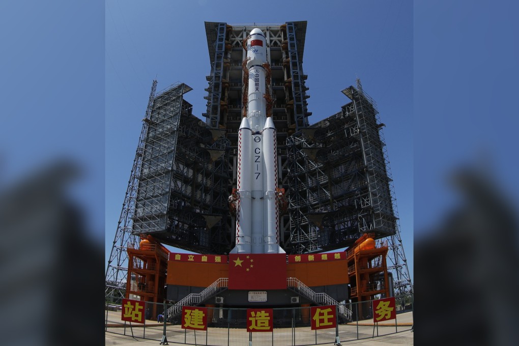 The Tianzhou 2 cargo spacecraft and Long March 7 carrier rocket are seen before being transferred to the launching area at the Wenchang spacecraft facility in Hainan. Photo: Xinhua, edit by SCMP