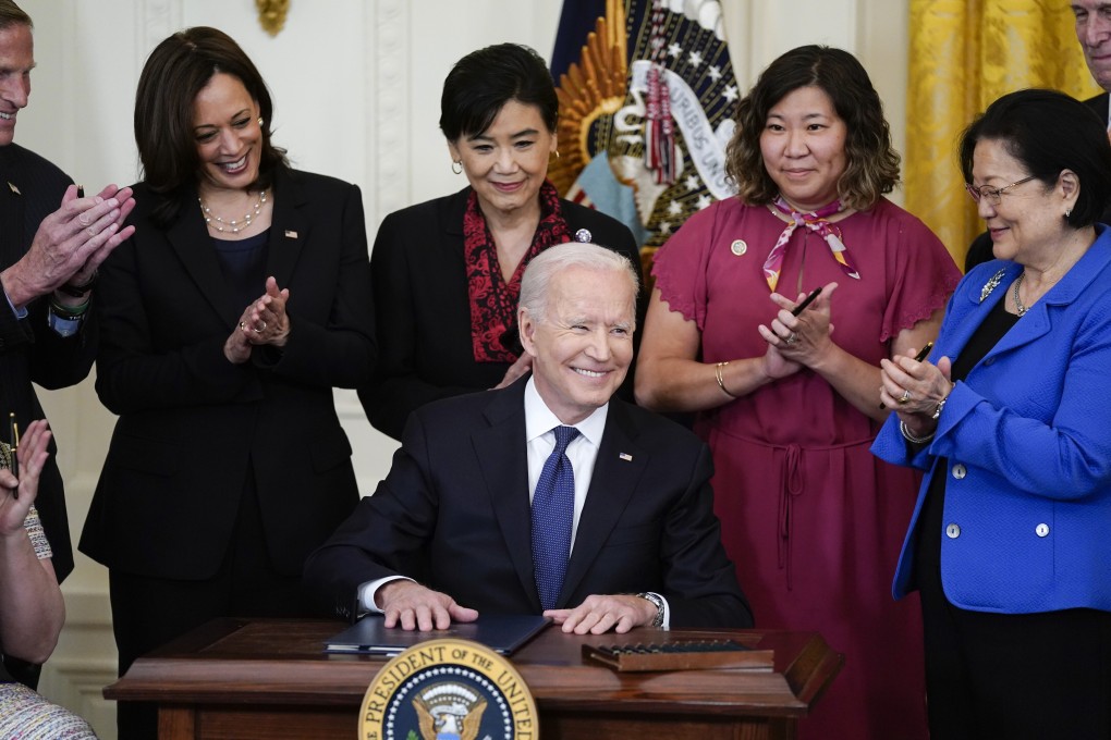 US President Joe Biden smiles after signing the Covid-19 Hate Crimes Act in the East Room of the White House on Thursday in Washington. Photo: AP