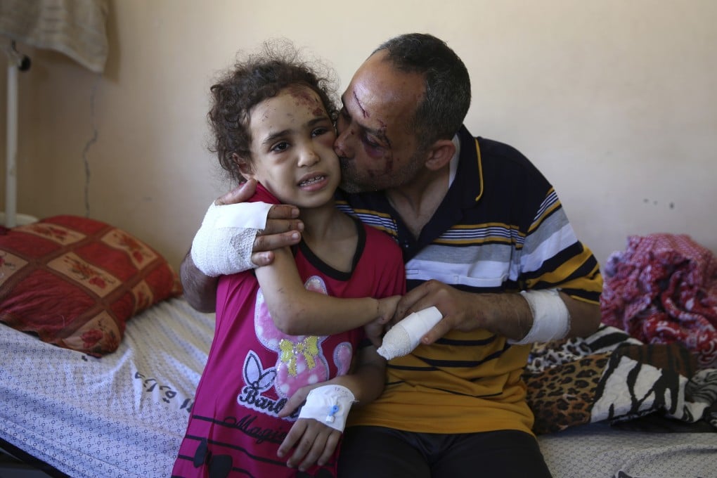 Suzy Ishkontana and her father Riad were the only survivors of their family. Photo: AP
