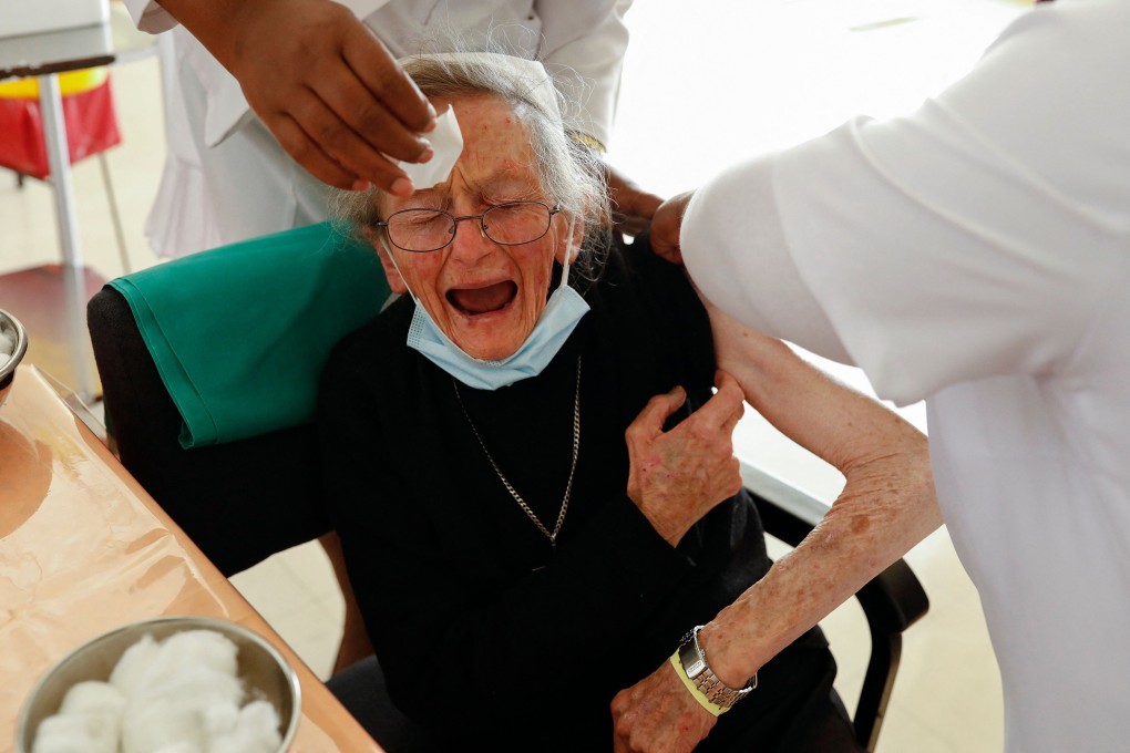An elderly woman gets vaccinated against Covid-19 in Pretoria, South Africa: Photo: AFP