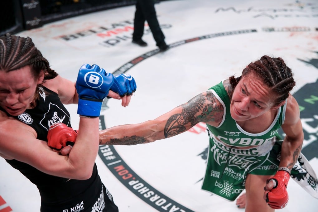 Cris Cyborg drops Leslie Smith late in the fifth round at Bellator 259. Photos: Bellator MMA