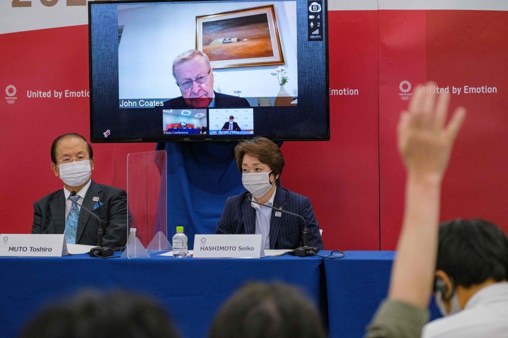 John Coates takes questions at an official press conference on Friday. Photo: AFP