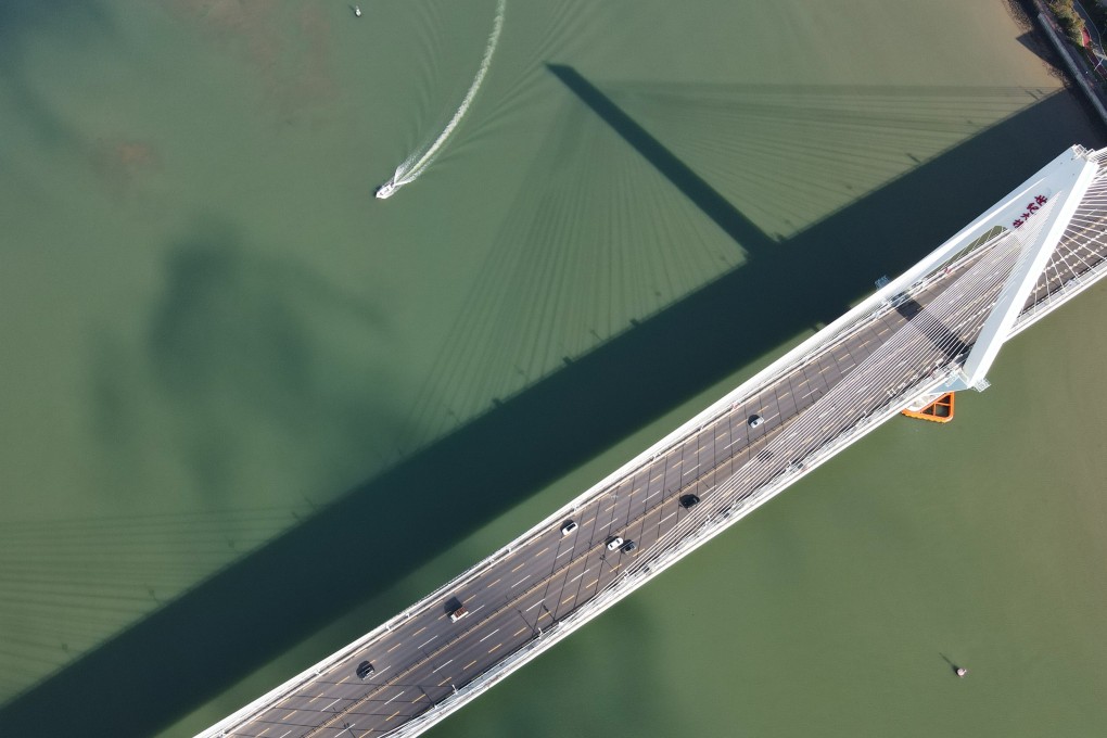 A boat sails past the Shiji Bridge in Haikou, Hainan province, on May 3. Haikou is an important city in the Belt and Road Initiative. The belt and road might be called a visionary development, coming at a time when leading Western nations had all but forgotten the critical role infrastructure can play in economic and social development. Photo: Xinhua