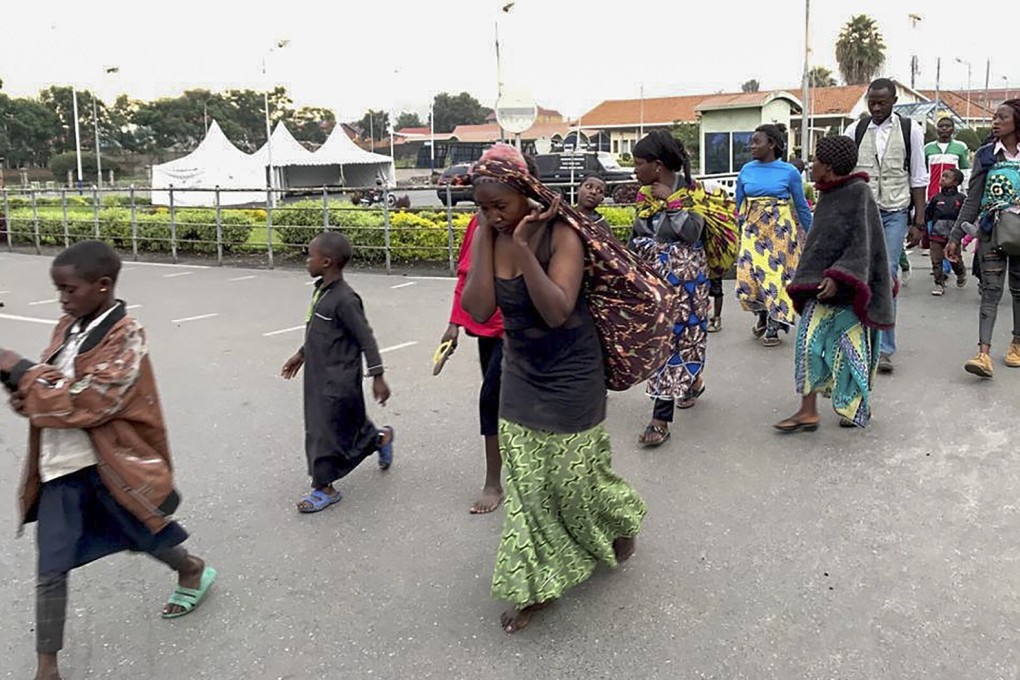 Congolese residents of Goma arrive in Rwanda on Sunday after fleeing from the Mount Nyiragongo volcano after it erupted on Saturday. Photo: EPA-EFE