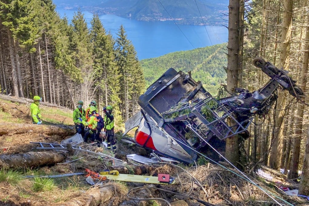 Rescuers at the site of the wreckage in the Piedmont region, northern Italy. Photo: Soccorso Alpino e Speleologico Piemontese via AP