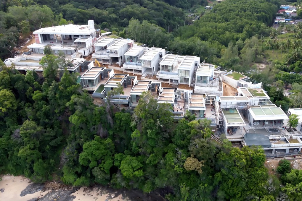 Royalty-free stock photo ID: 1970073409 Phuket,Thailand, 13,September,2020: Villas under construction on the ledge, real estate development in Phuket, drone viewcoconut palms. Shutterstock Images
