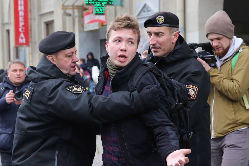 Police officers detain journalist Roman Pratasevich attempting to cover a rally in Minsk, Belarus in 2017. Photo: EPA-EFE