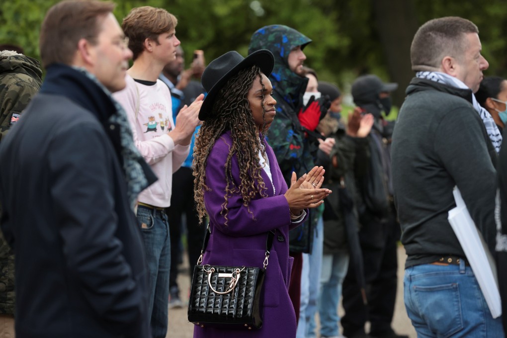 People take part in a vigil for Sasha Johnson, a Black Lives Matter activist, who was shot near her home in Peckham, London, UK on Monday. Photo: Reuters