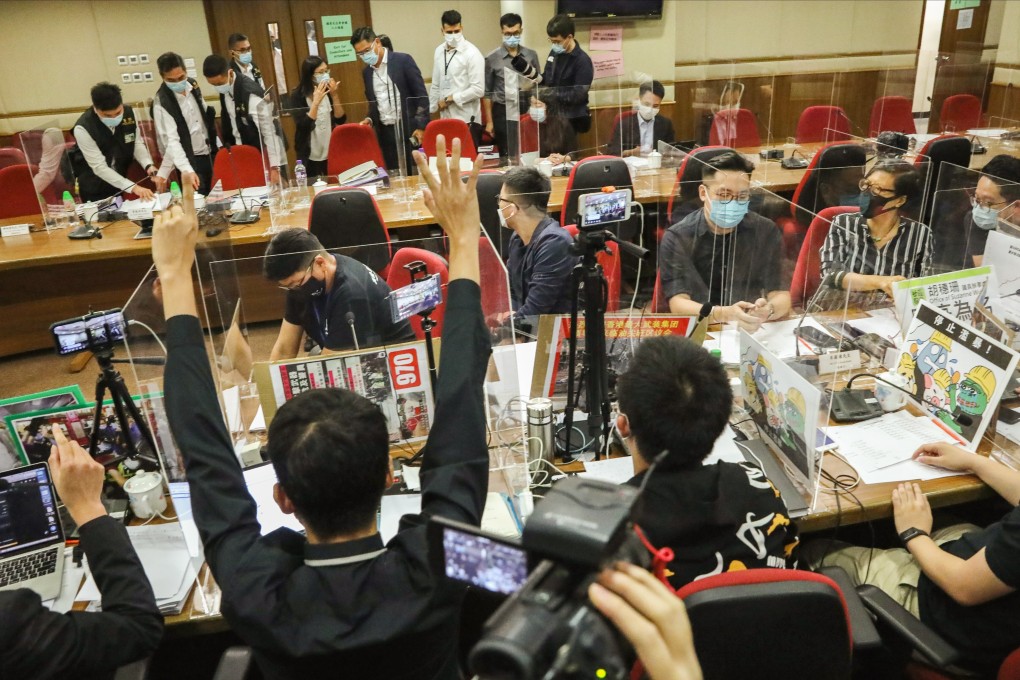 Anti-government protesters at a meeting of the Yau Tsim Mong district council attended by Commissioner of Police Chris Tang Ping-keung in September last year. Photo: May Tse