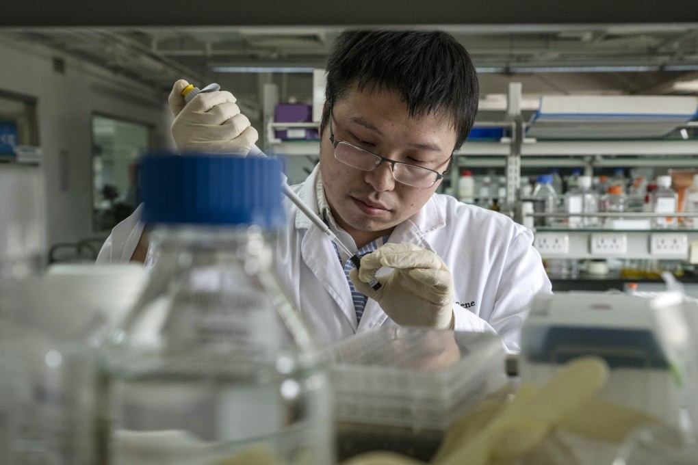A researcher prepares a sample inside a laboratory at BeiGene Ltd’s research and development centre in Beijing on May 24, 2018. The company made its Hong Kong trading debut in August 2018. Photo: Bloomberg