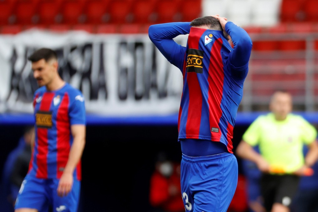 Eibar's Miguel Atienza reacts after the team's defeat against FC Barcelona in their final Spanish La Liga match of the 2020-21 season at the Ipurua stadium in Eibar, Spain. Photo: EPA