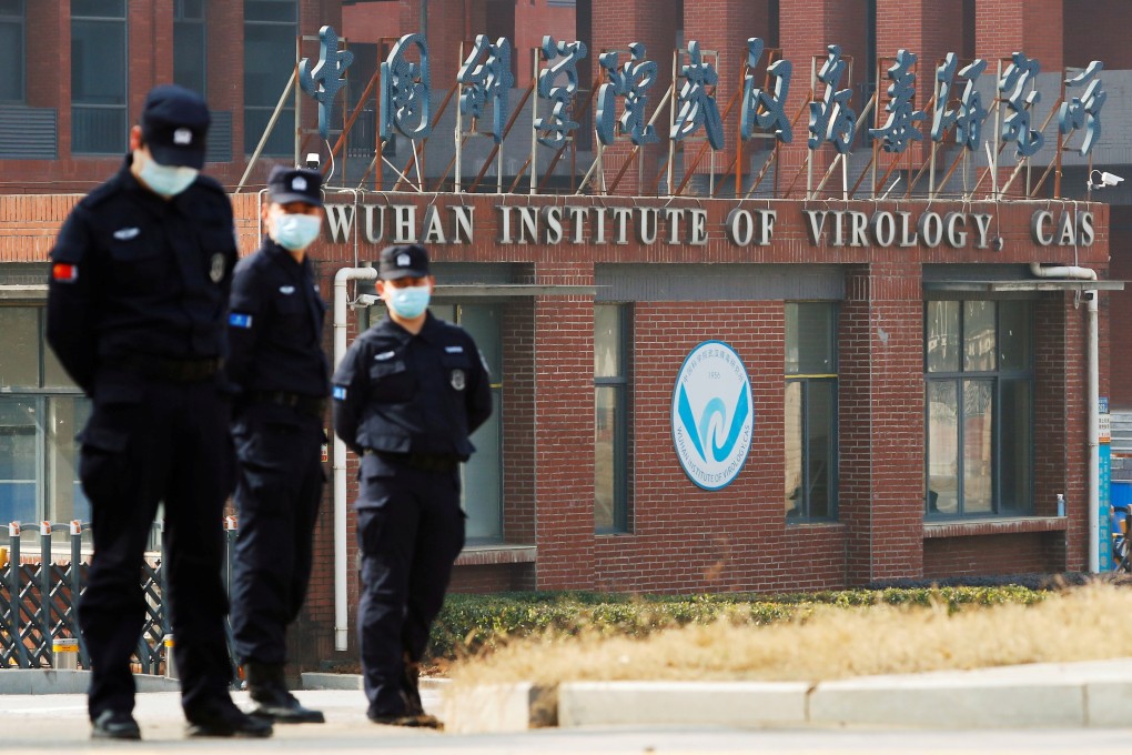 Security personnel keep watch outside Wuhan Institute of Virology during the visit by the World Health Organization team tasked with investigating the origins of the coronavirus disease in Wuhan, China on February 3. Photo: Reuters