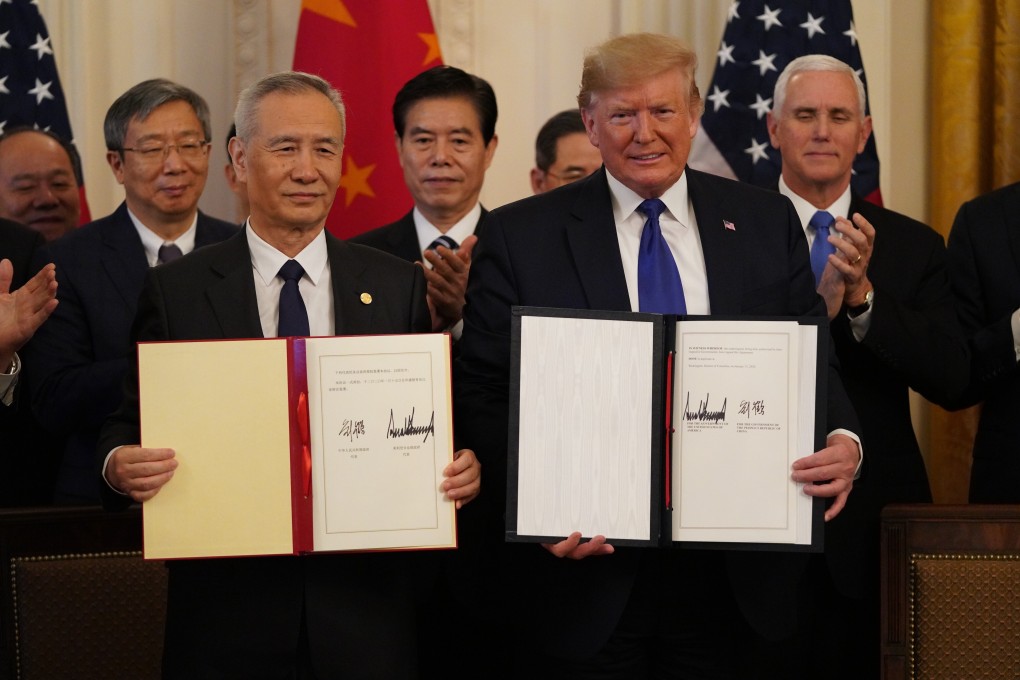 Then-US president Donald Trump and Chinese Vice-Premier Liu He signed the phase-one trade deal in January 2020. Photo: Xinhua