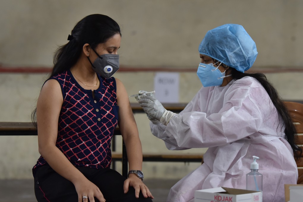 A woman gets vaccinated against Covid-19 in Jammu, India. Photo: Xinhua