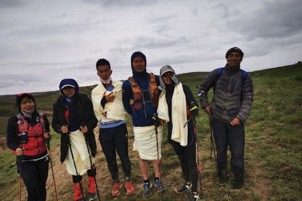 A goat herder called Zhu Keming (far right) rescued six runners in China after bad weather killed 21 others during an ultramarathon. Photo: Handout