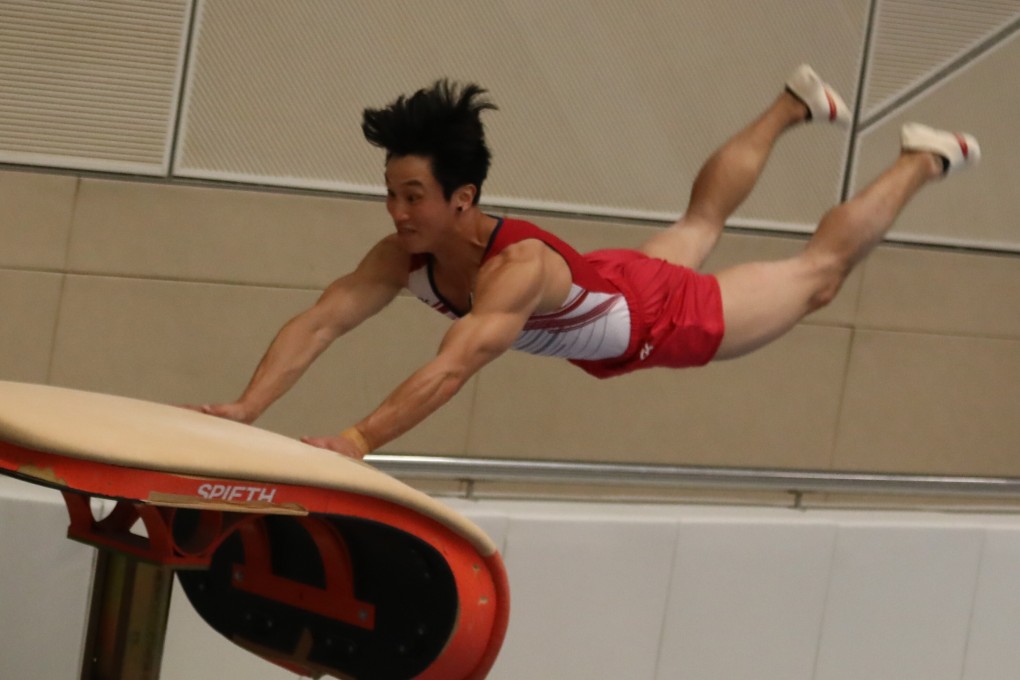 Shek Wai-hung performs a vault jump during a media event at the Shun Lee Tsuen Sports Centre in Kwun Tong on Thursday. Photo: Jonathan Wong