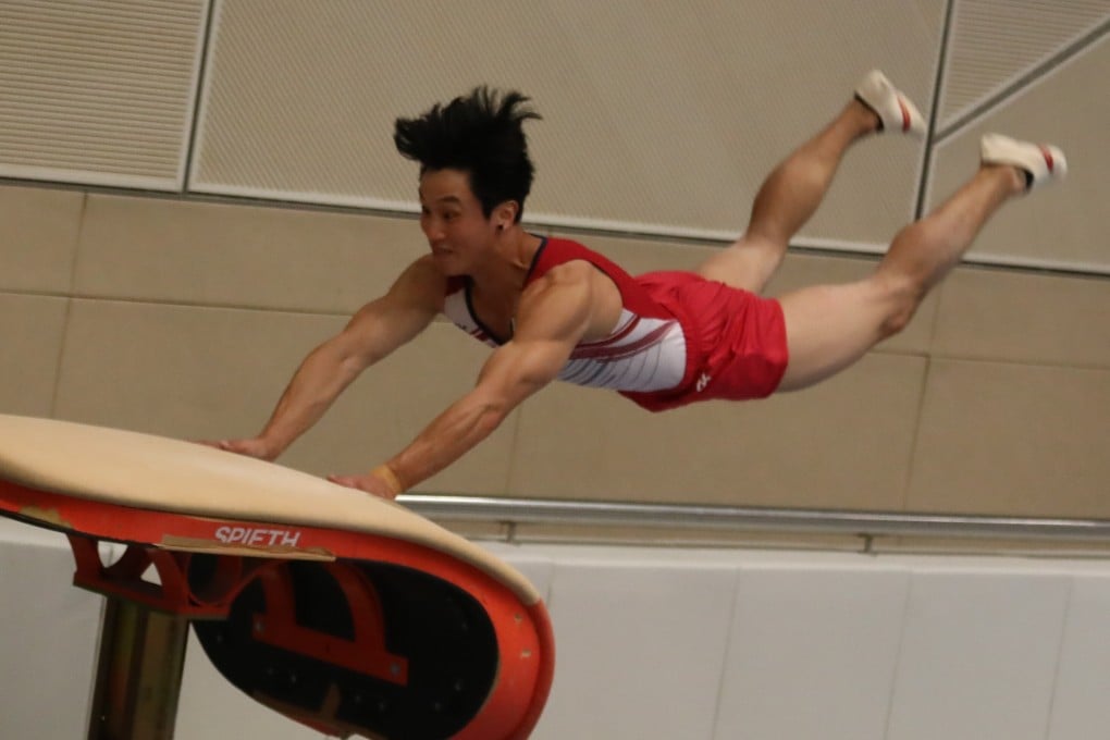 Shek Wai-hung performs a vault jump during a media event at the Shun Lee Tsuen Sports Centre in Kwun Tong on Thursday. Photo: Jonathan Wong