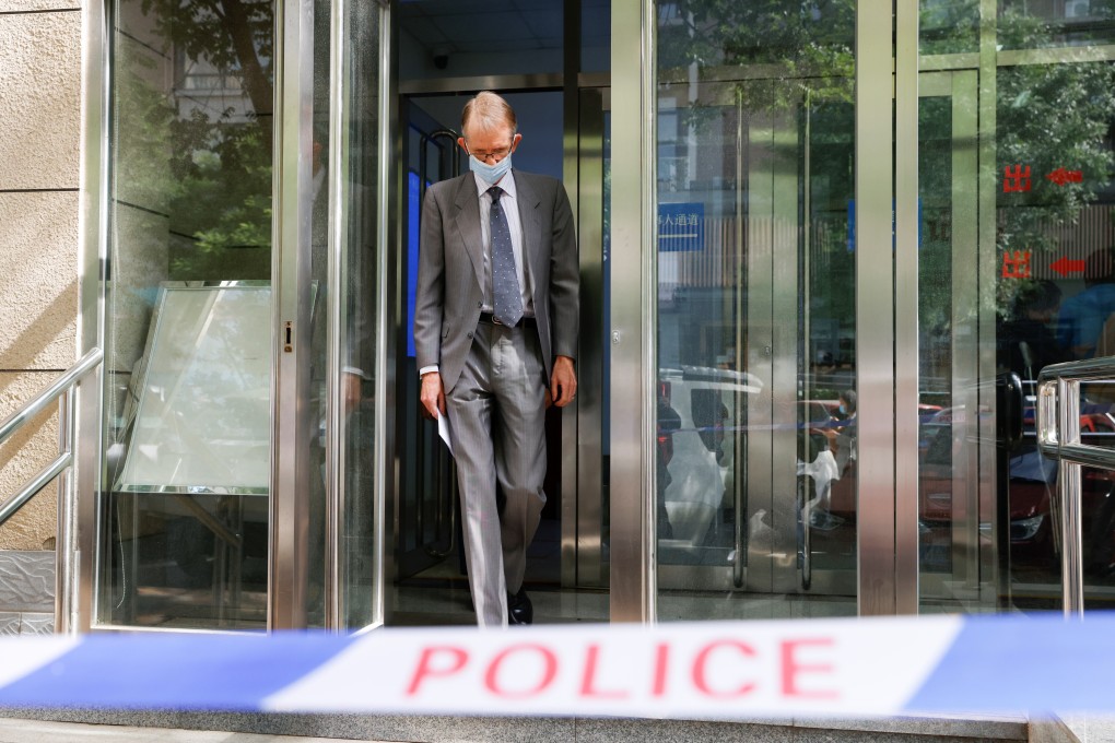 Australian ambassador to China Graham Fletcher walks out of the Beijing Second Intermediate People’s Court after being denied access to the trial of Australian writer Yang Hengjun on Thursday. Photo: Reuters