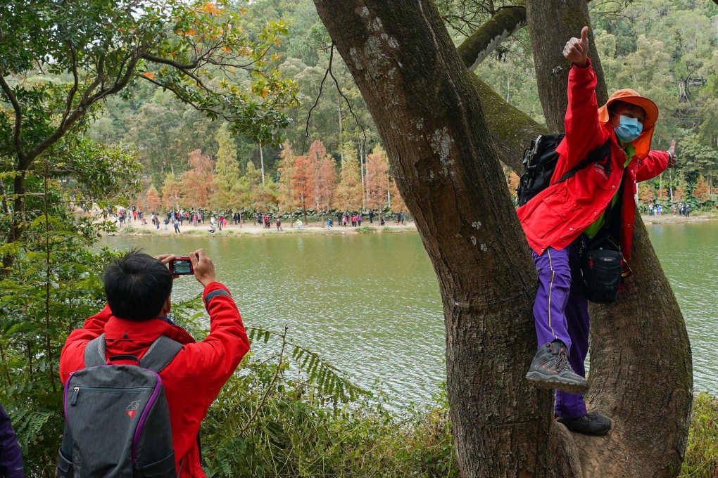 Hikers enjoy the Lau Shui Heung Reservoir in Pat Sin Leng Country Park on January 9. Photo: Felix Wong