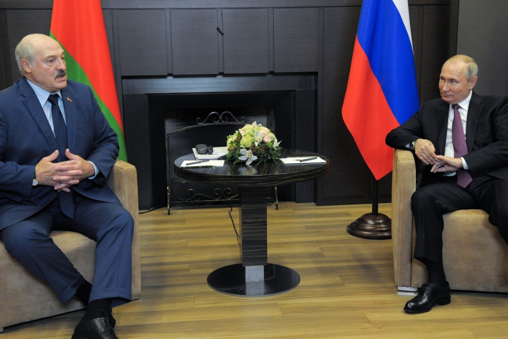 Russian President Vladimir Putin (right) listens to Belarusian President Alexander Lukashenko during their meeting in the Black Sea resort of Sochi on Friday. Photo: AP