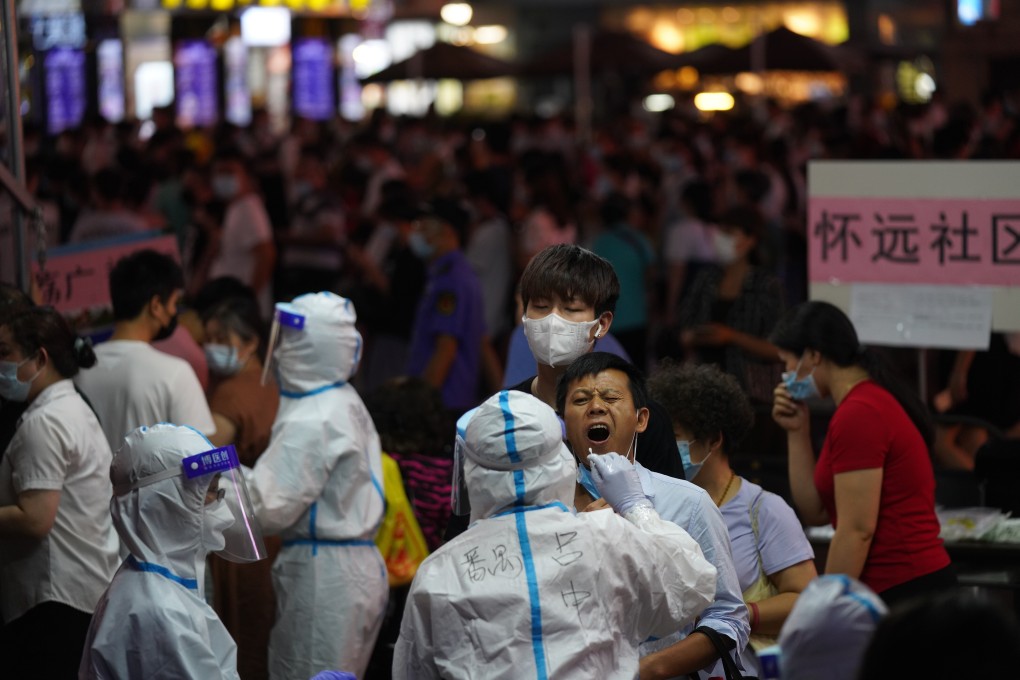 A resident gets tested for coronavirus in Liwan district in Guangzhou. Photo: AP