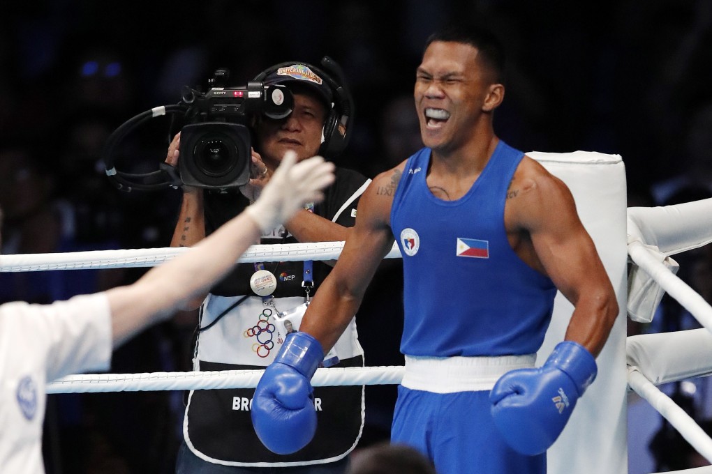 Eumir Marcial of Philippines stands in a corner as Manh Cuong Nguyen (bottom) of Vietnam hits the canvas during the Southeast Asian (SEA) Games in Manila, Philippines. Photo: EPA