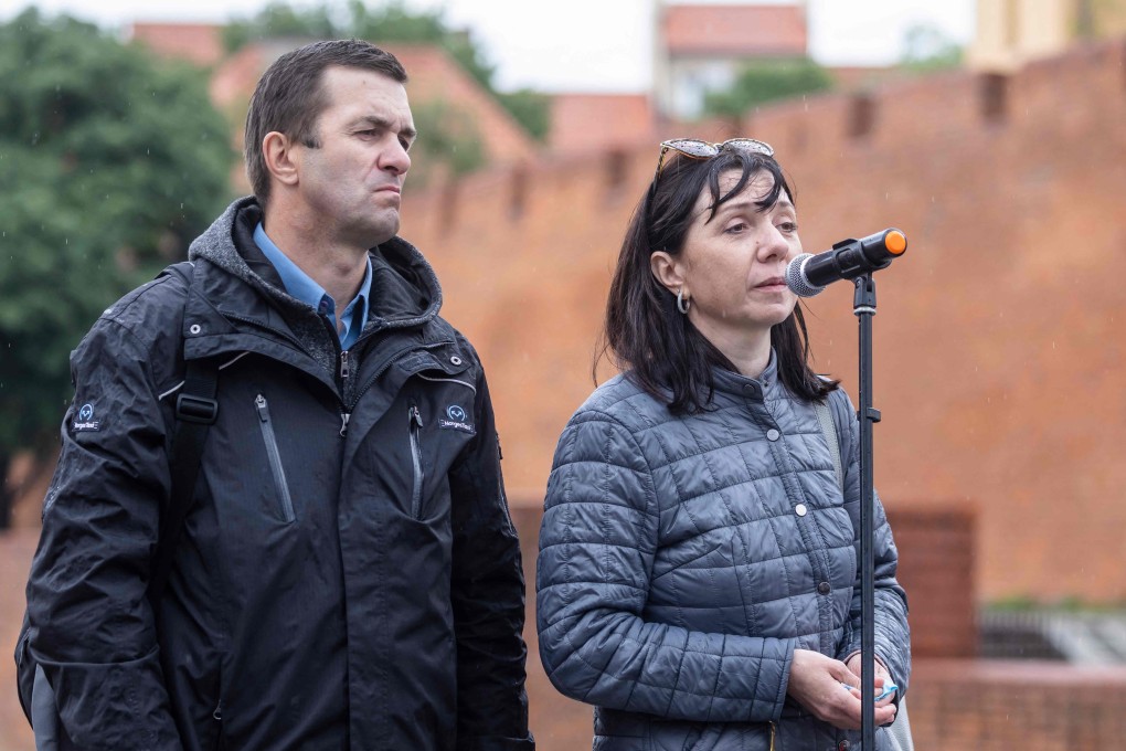 Natalia and Dmitry Protasevich, parents of Belarusian journalist Roman Protasevich, demand freedom for their son at Castle Square in Warsaw, Poland on Saturday. Photo: AFP